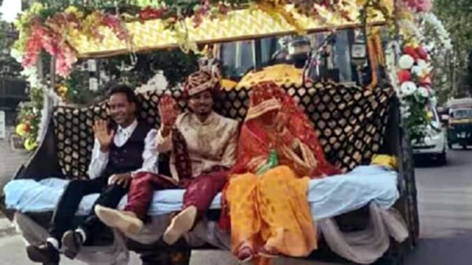 Groom arrived riding on JCB, bid farewell by sitting in bucket